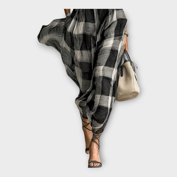 Φόρεμα με εκλεπτυσμένη ροή και κομψότητα