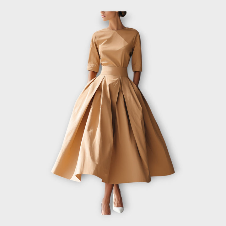 Midi φόρεμα με εκλεπτυσμένη minimal αισθητική